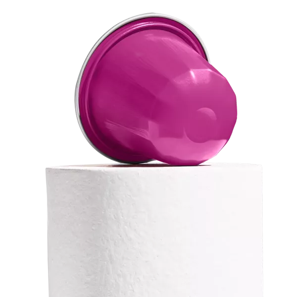 Rose Pink AluSense aluminium coffee capsule displayed on a white pedestal against a white background.